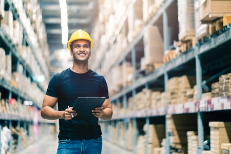 smart-indian-engineer-man-wearing-safety-helmet-doing-stock-tick-check-cardboard-stock-product-management-factory-warehouse-background smart-indian-engineer-man-wearing-safety-helmet-doing-stock-tick-check-cardboard-stock-product-management-factory-warehouse-background