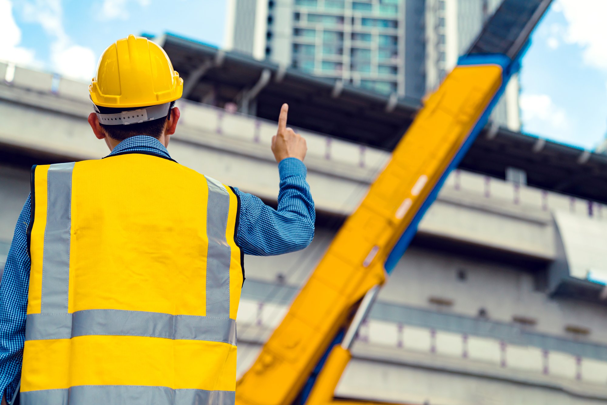 smart-asian-engineer-manager-with-safety-uniform-checking-site-construction-with-steel-concrete-sturcture-background smart-asian-engineer-manager-with-safety-uniform-checking-site-construction-with-steel-concrete-sturcture-background