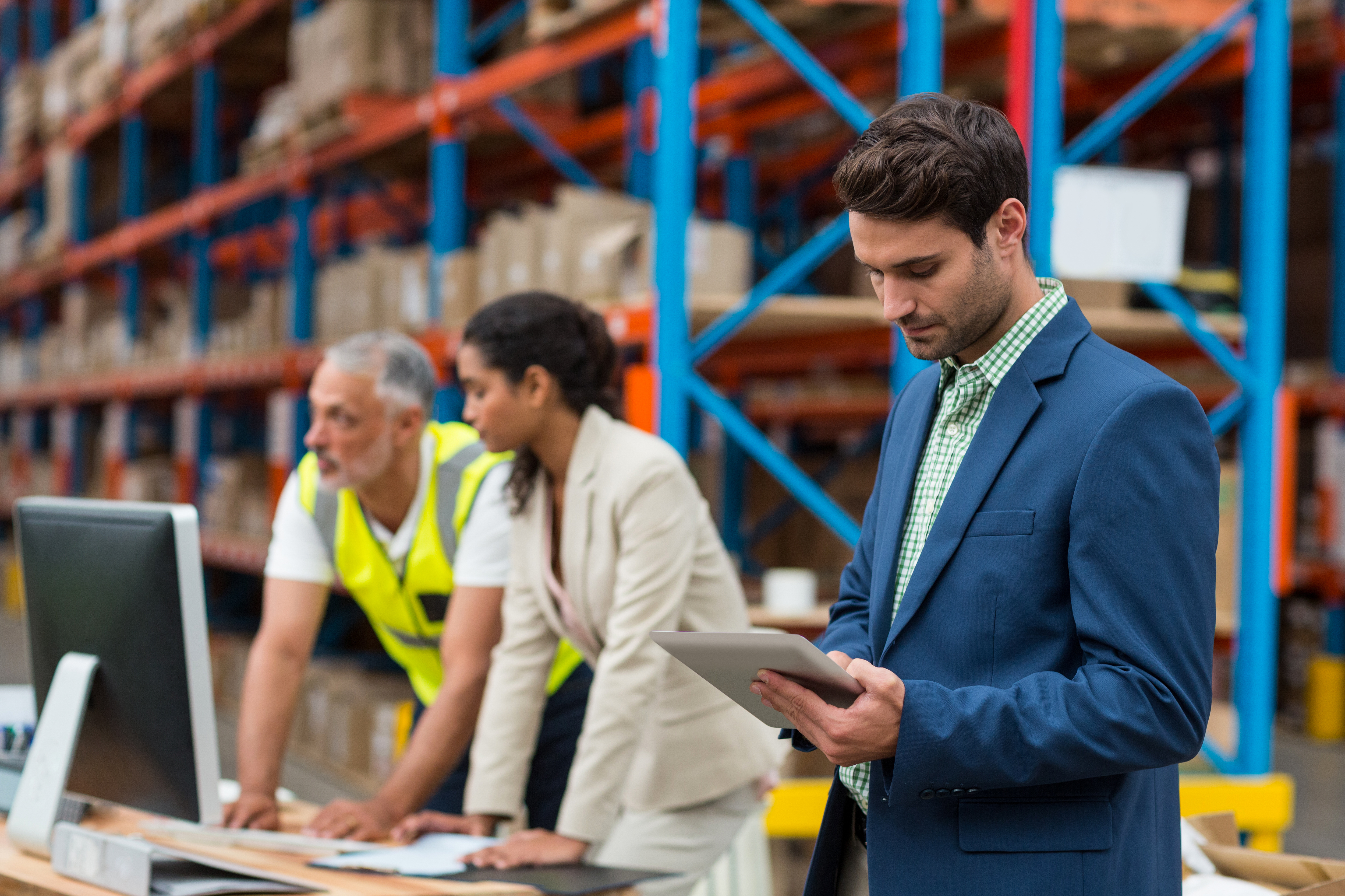 Manager in warehouse preparing for GDP audit